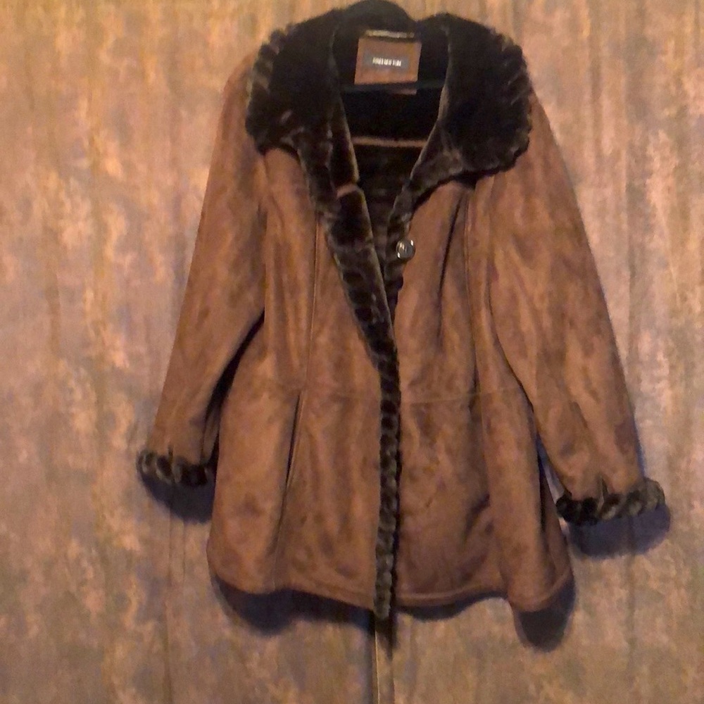 This is a Vintage type coat. Never worn